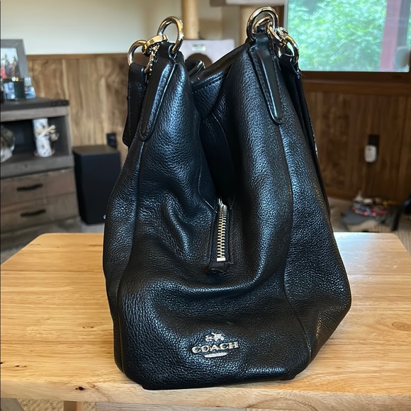 Coach Handbags - Coach Black Shoulder Bag with Sleek Design